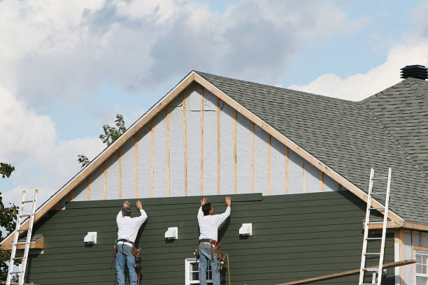 Professional Siding technician working in Friedens, PA